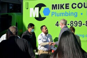 Mike Counsil is shaking hands with an employee in San Jose, CA.