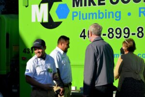 The workers with happy customers.