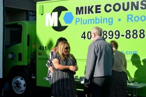 Jeanette and Mike from Mike Counsil Plumbing and Rooter, smiling for the camera