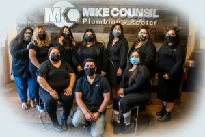 Mike Counsil Plumbing and Rooter staff wearing masks