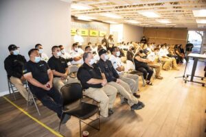 Attendees sitting on chairs during the Mike Counsil Plumbing and Rooter event in San Jose, CA.