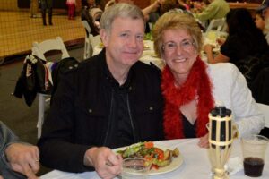 At the Mike Counsil Plumbing and Rooter event in San Jose, CA, a man and woman shared a meal.